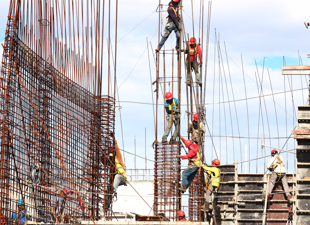 Construction professionals reviewing work on site